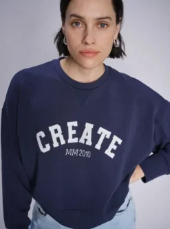 Mos Mosh Celli collegepaita, spellbound